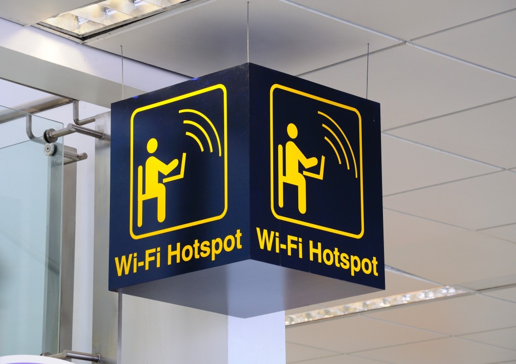 Wi-fi Hotspot sign, East Midlands Airport, Leicestershire, UK, Western Europe.