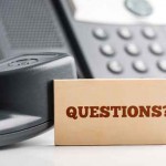 Small Signage for Questions on Telephone Desk